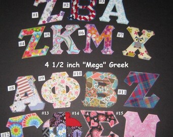 May include: Assortment of iron-on Greek letters in various patterns and colors, including floral, patriotic, and tie-dye designs. The letters are labeled with numbers and sizes, with the text "RealStytch" and "4" Traditional Greek" and "4 1/2 inch Mega Greek" visible.