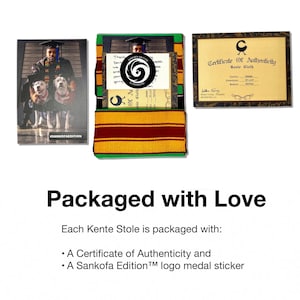 May include: An overhead shot of a graduation package. It includes a Kente cloth stole with red, yellow, and green stripes, a certificate, and a photo. The photo shows a graduate with two dogs. Text on the photo reads "#SANKOFAEDITION".