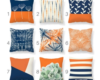 navy blue and orange pillows