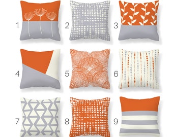 orange pillows and throws