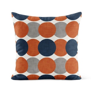 Orange pillows and clearance throws
