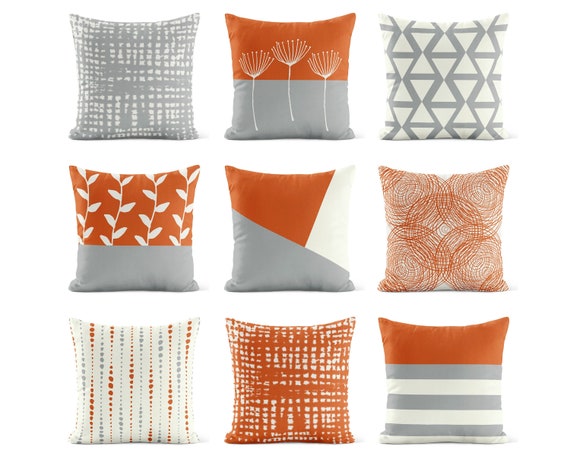 burnt orange and white throw pillows