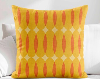 May include: A square throw cushion featuring a repeating geometric pattern of vertical orange and yellow ovals. The design consists of alternating columns of solid orange and yellow shapes that overlap to create a cohesive, symmetrical grid layout.