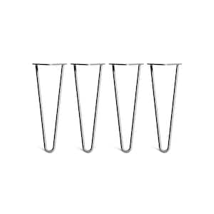 May include: Set of four silver metal hairpin legs for furniture. Each leg has a flat top plate and a V-shaped base.