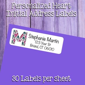 May include: A sheet of 30 personalized address labels with a heart and initial design. The label features the name "Stephanie Martin", the address "123 Your St", and the city, state, and zip code "Bristol, CT 06010".