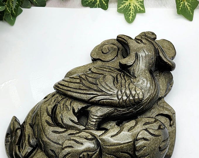Hand-Carved Golden Obsidian Phoenix Sculpture: Symbol of Renewal