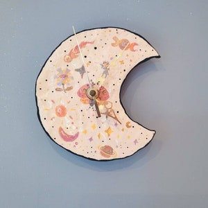 The Moon Magic Clock - the Uncannies Collection. Hand made ceramic clock. Moon Comet moth stars flower eye planet sun Wall décor Wall clock.
