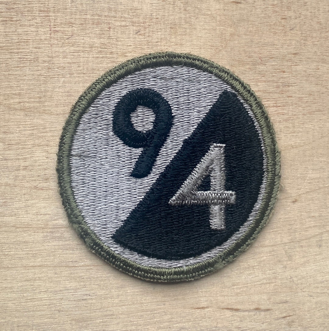 WW2 94th Infantry Training Division 'neuf Cats' OD Border US Army