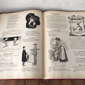 May include: An open book with black and white illustrations and text. The book is open to a page with the title "Cheer Up!" and a cartoon of a woman sitting on a bench with a dog. The text on the page reads "What if she did throw you down?" and "Do you think we'd be the best, if you were in the cart?"