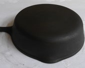 Unmarked Wagner 5, 8 quot cast iron skillet. Manufactured in the 1950 39 s. Excellent condition.
