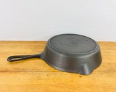 Griswold Slant Logo 6, 699 E. quot ERIE quot cast iron skillet w Heat ring. Erie PA in 1906-1912. Excellent used condition. Rare, hard to find.