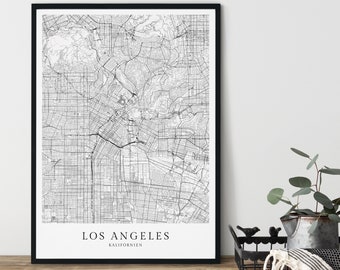 May include: Black and white map print of Los Angeles, California in a black frame. The map shows the city streets and neighborhoods. The text "Los Angeles, Kalifornien" is printed below the map.