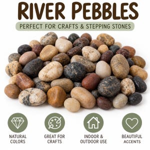 May include: A collection of smooth, multi-colored river pebbles in shades of tan, brown, gray, and black. The image includes the text RIVER PEBBLES, PERFECT FOR CRAFTS & STEPPING STONES, NATURAL COLORS, GREAT FOR CRAFTS, INDOOR & OUTDOOR USE, and BEAUTIFUL ACCENTS.
