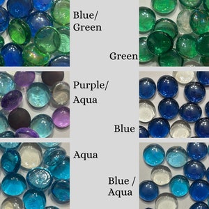 Different mosaic gem options shown to choose from.  Gems are used to place in cement when making stepping stone. Several different options to choose from including one of our top sellers - Purple/Aqua