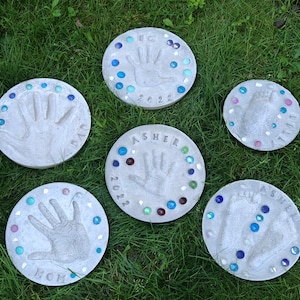 Do It Yourself family hand and foot print stepping stones. DIY family stepping stone kits.