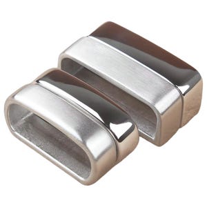 May include: Two rectangular metal loops with rounded corners, featuring a combination of brushed matte silver-tone surfaces on the front and polished, reflective silver-tone finishes on the top and side edges, arranged in a staggered formation.