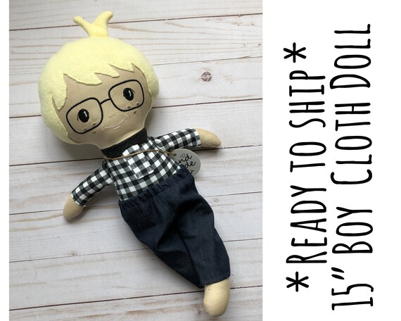 soft doll with glasses