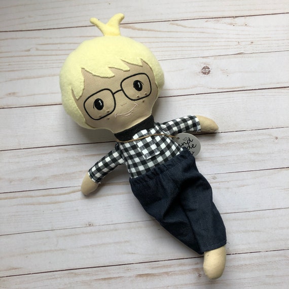 boy doll with glasses