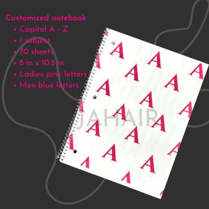 May include: A white notebook with a spiral binding. The cover is printed with a repeating pattern of pink capital letter 'A's. The notebook is 8 inches by 10.5 inches.