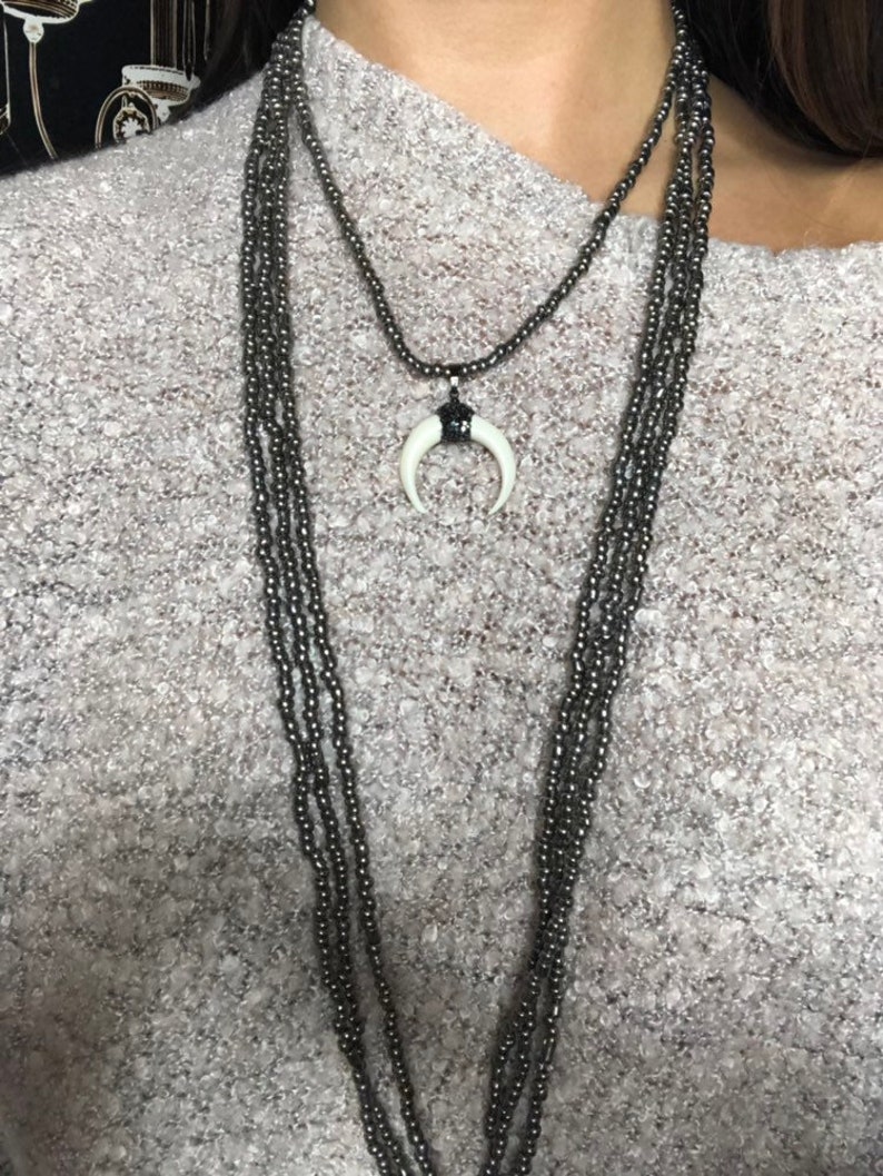 Neclace made of cow horn and mother of pearl