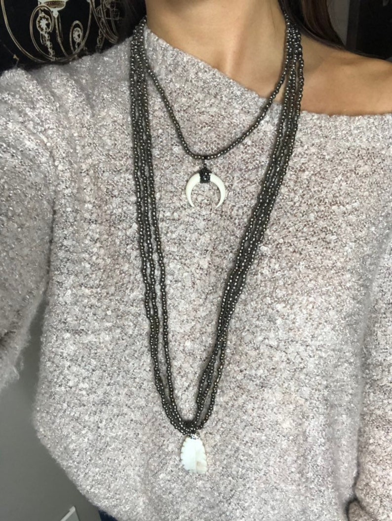 Neclace made of cow horn and mother of pearl