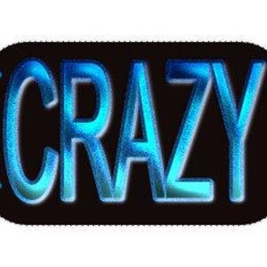 May include: A black rectangular sign with rounded corners features the word "CRAZY" in large, vibrant blue letters. The letters have a glittery texture and a white outline, creating a glowing effect. Two small blue dots are on the left side of the sign.