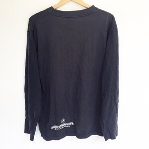 May include: Black long-sleeve shirt with a white graphic print on the bottom. The graphic print says "The Killers" and "Sam's Town".