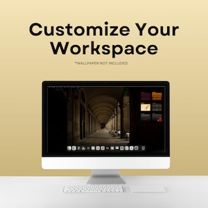 May include: A silver desktop computer with a black screen displaying a photo of an arched hallway. The screen also shows a variety of icons and folders. The computer is on a white desk with a white keyboard and a white mouse pad.