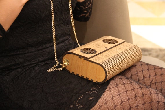 This Simple And Stylish Clutch Is Made From Wood And Leather