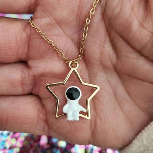 Jin astronaut necklace, Jin necklace