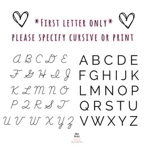 May include: A black and white image showing the alphabet in both cursive and print styles. The text *FIRST LETTER ONLY* and PLEASE SPECIFY CURSIVE OR PRINT is also included in the image.