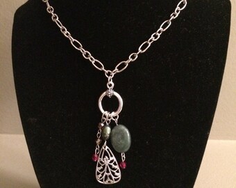 Silver chain with green pendant