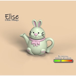 May include: A light green teapot shaped like a bunny rabbit with pink ears, a pink bow, and a pink nose. The teapot has a white face with black eyes and whiskers. The text "Elise Little-Things" is above the teapot. The text "3D PRINTING DIGITAL STL FILES" is below the teapot with a progress bar.