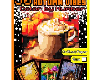May include: 50 Mystery Mosaics Autumn Vibes Colour by Number on black paper, 4mm squares. The cover image shows a close-up of a cup of coffee with whipped cream. Three smaller images show a forest path, mushrooms, and a cabin in the woods.