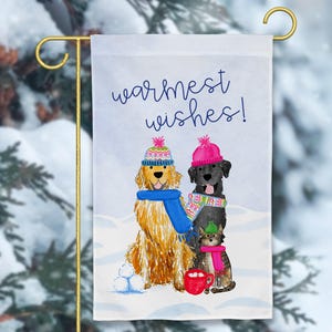 May include: A winter-themed garden flag with a golden retriever, a black labrador, and a cat wearing winter hats and scarves. The text "warmest wishes!" is printed on the flag.