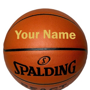 Customized Spalding Basketball with Gold Text