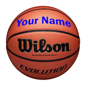 May include: A brown basketball with black lines and the text "Wilson Indoor Game Ball" and "Evolution" printed on it. The text "Your Name" is printed in blue on the basketball.