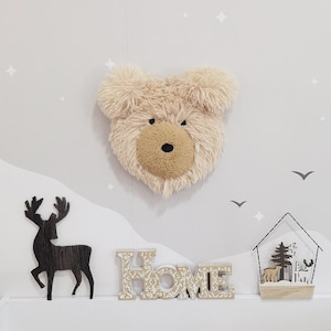 May include: A set of three ceramic mugs with a speckled, matte finish. Each mug features a different color: light blue, cream, and gray. The mugs have a simple, modern design and a comfortable handle.