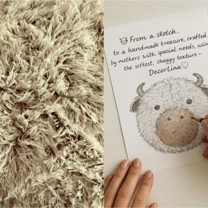 May include: Close-up of a beige, shaggy rug with a soft texture. Next to it, a drawing of a fluffy cow face with the text "From a sketch... to a handmade treasure... DecorLina."
