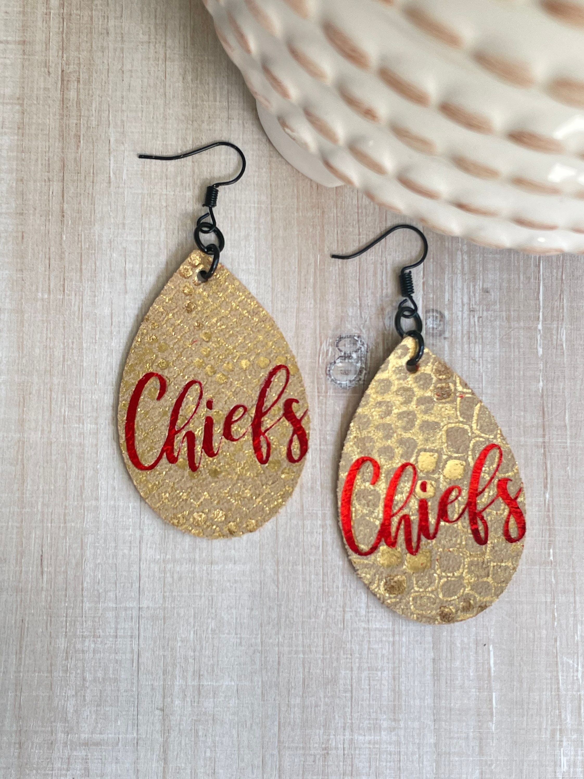 Chiefs leather earrings deals