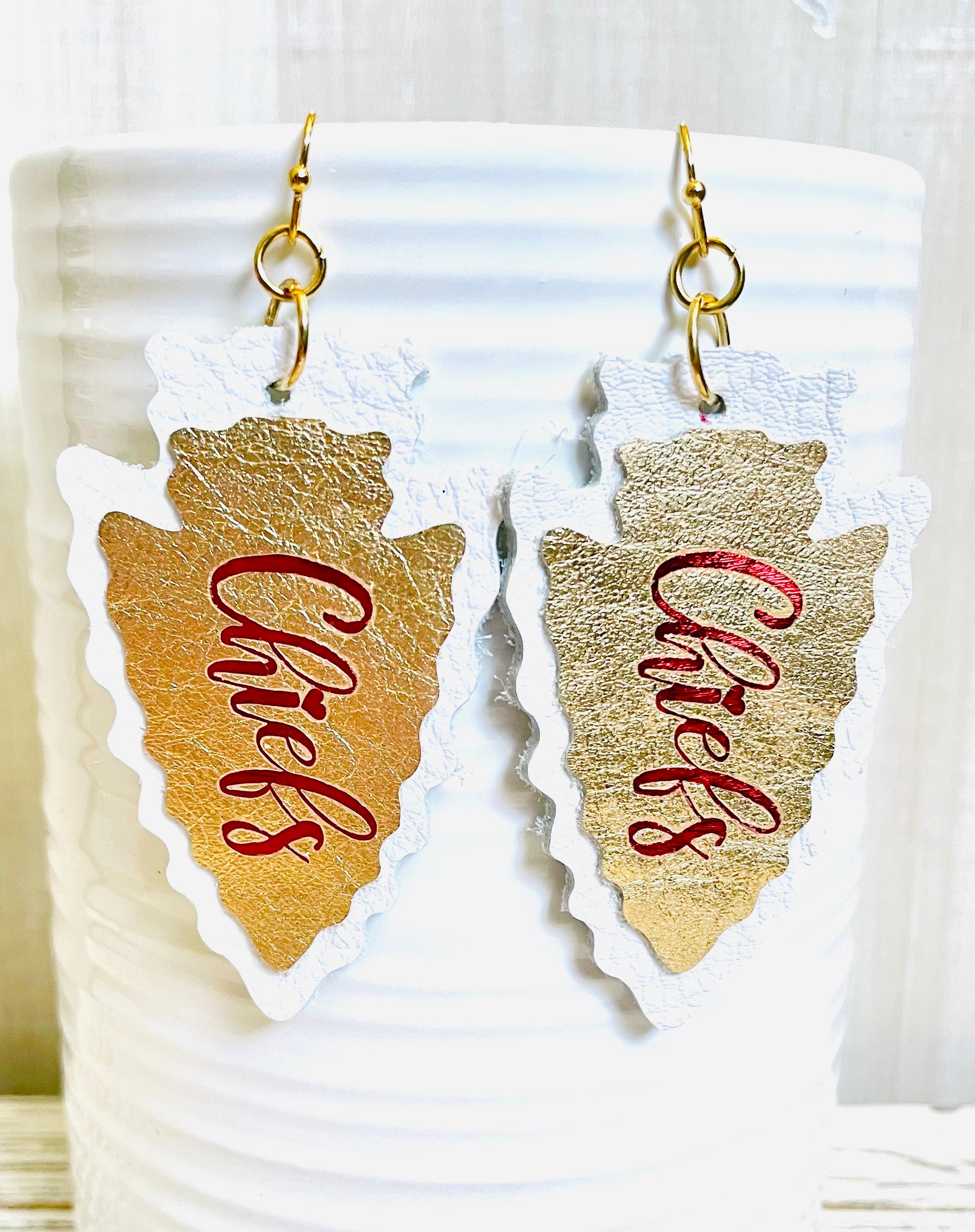 Chiefs leather earrings deals