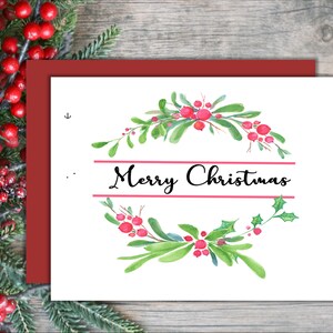Cartolina di buon Natale: ghirlanda di agrifoglio