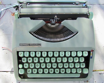 Reserved for Chrislyn.. Antique Hermes Baby typewriter portable typewriter Vintage working typewriter, great condition