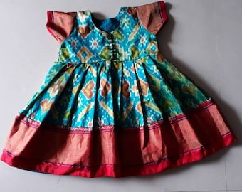 Blue Pochampalli Silk Baby Frock: Red & Golden Border Dress