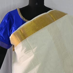 Kerala mundu style cotton saree with contrast blue blouse - half white with golden colour kasavu border -