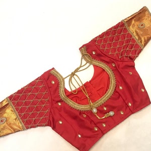 Red aari work blouse -  kanchipuram pattu saree blouse - wedding aari work blouse .