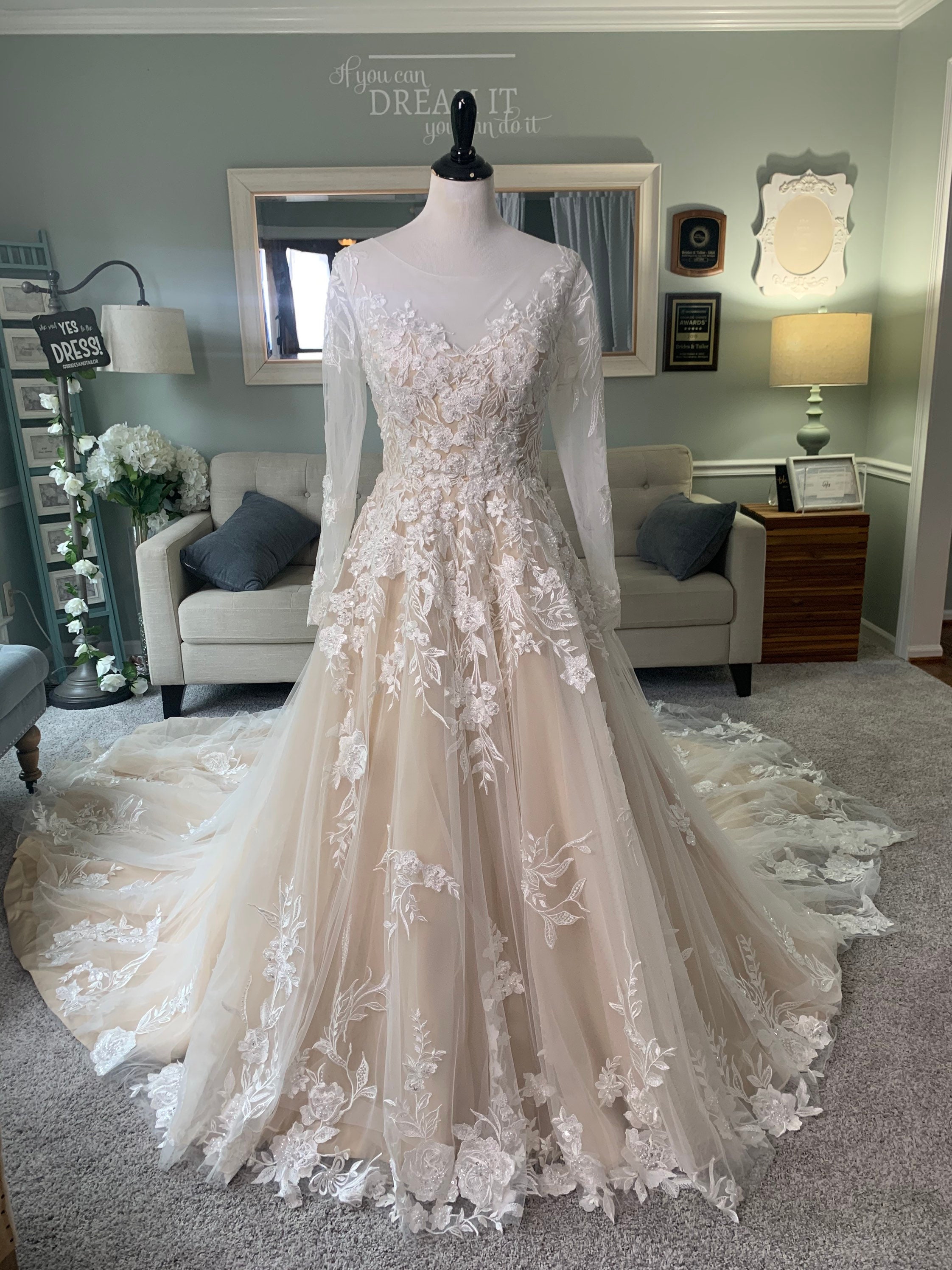 ivory champagne wedding dress Soft Ivory/ Light Floral Embroidered A-Line Tulle Bridal Gown Custom Color / Floor Length / US8 with appliqus leading down to the lace trimmed train. Neda Champagne Wedding Dress: Ivory