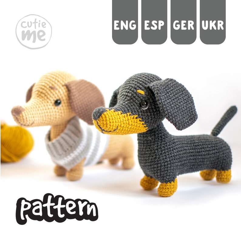 May include: Crochet pattern for a dachshund dog amigurumi. The pattern includes two versions of the dog, one with a tan and brown body and a grey sweater, and the other with a black body and yellow accents. The pattern is available in English, Spanish, German, and Ukrainian.