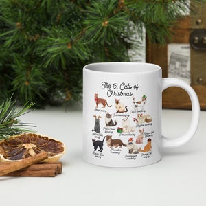 Celebrate the holidays with our 12 Cats of Christmas mugs! Perfect for cozy drinks, festive gifting, and cat lover decor. Shop now!