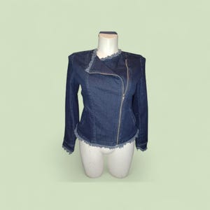 May include: A dark blue denim jacket with a frayed collar, hem, and cuffs. The jacket features a diagonal zipper closure and long sleeves. The jacket is displayed on a white mannequin.